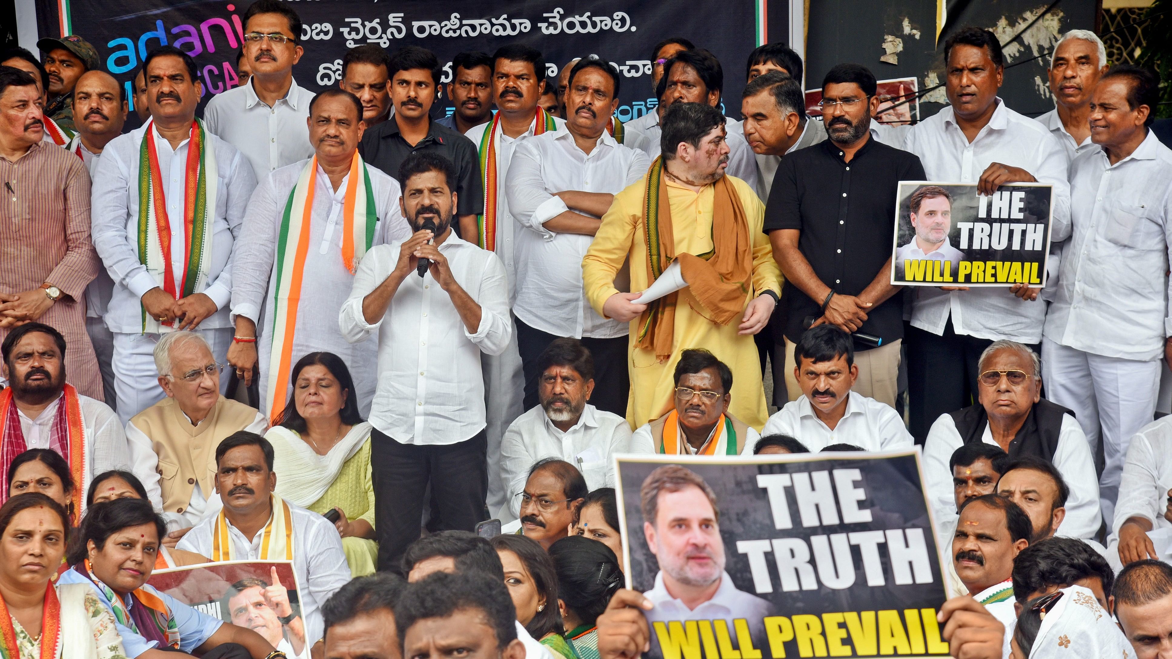 <div class="paragraphs"><p>Telangana Chief Minister Revanth Reddy with ministers and Congress party leaders during a protest at the Enforcement Directorate’s (ED) office on Thursday.</p></div>